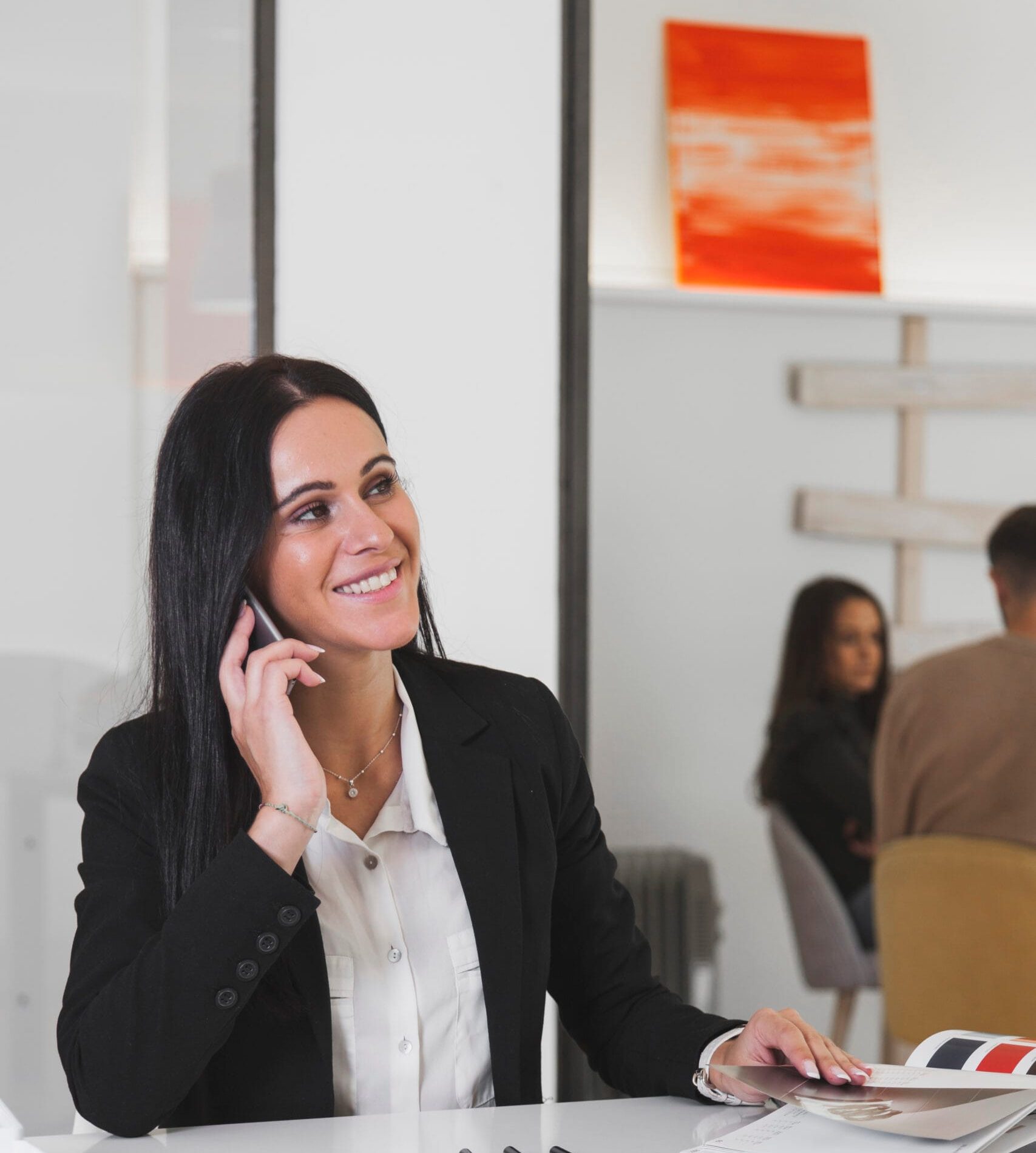 smiling-woman-talking-office